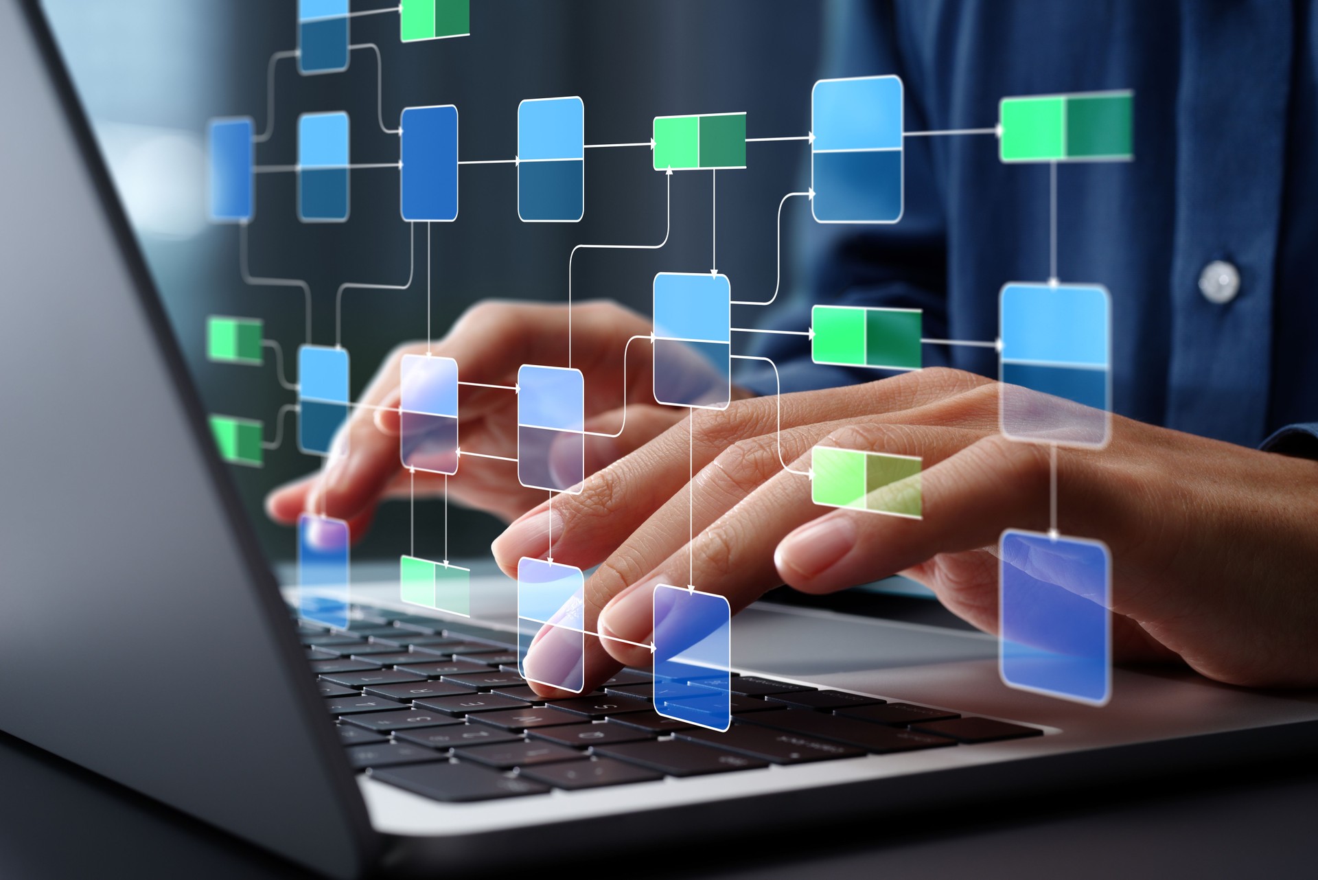 Data flow diagram. Process decomposition and data flow analysis. Engineer using laptop computer to manage data processing system.